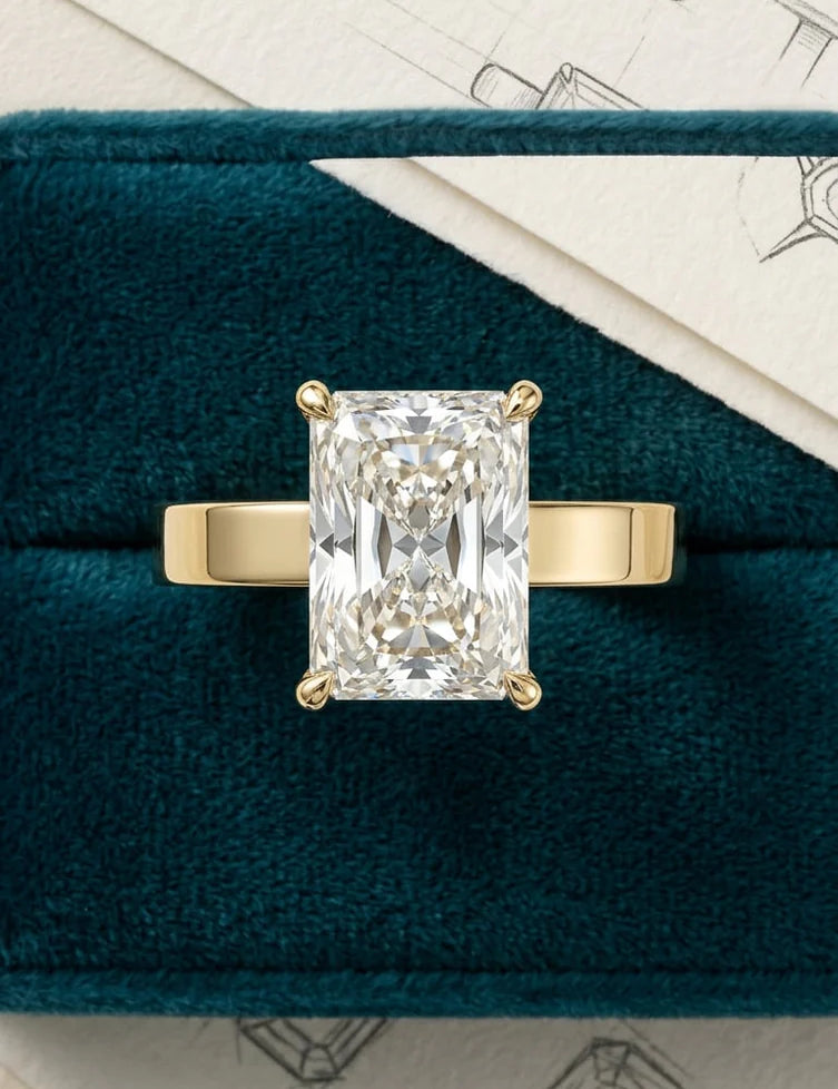 promiseradiantdiamondringtopviewgreenbackground.webp